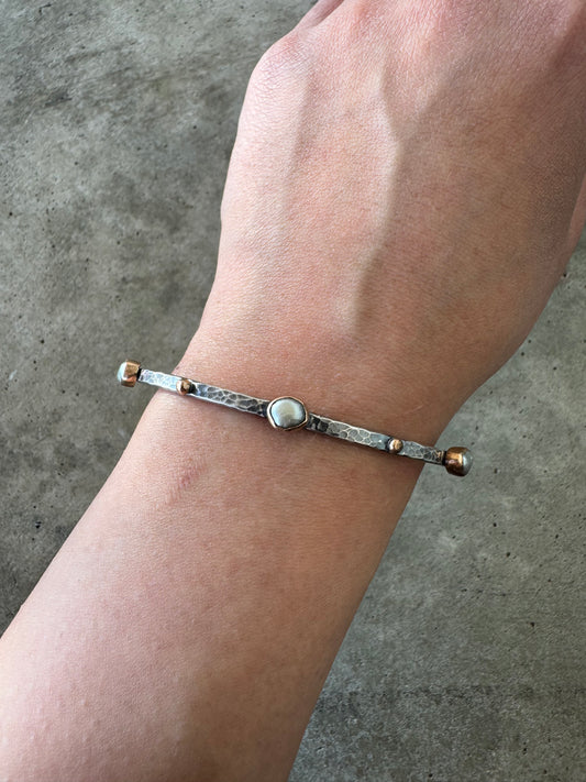 Pearl and dot cuff